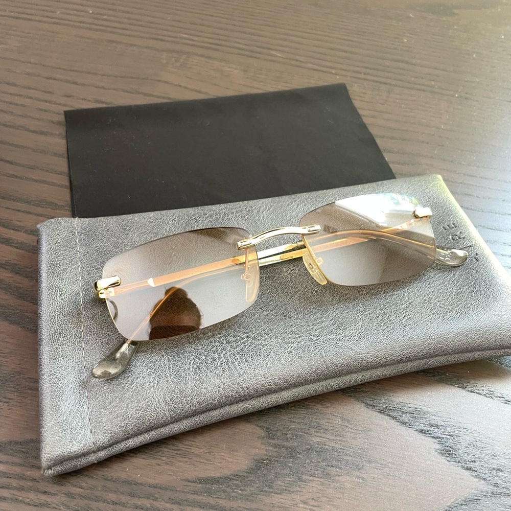 AIRE gold glasses